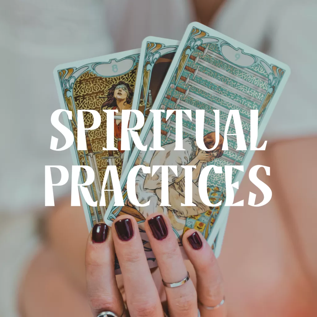 Hand holding tarot cards for spiritual practices and self-discovery. Text on image "Spiritual Practices"