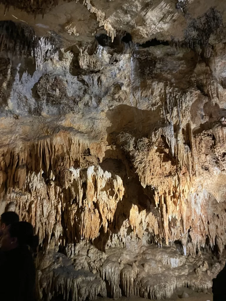 Luray Caverns showcasing stunning stalactites and stalagmites formations illuminated by warm light.